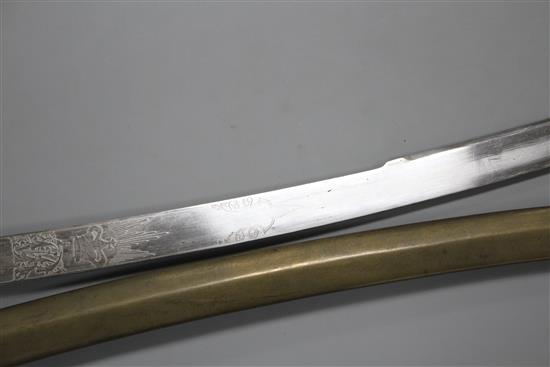 A Victorian general officers mameluke sword, gilt hilt, ivory grips, the etched blade by Ranken & Co. Calcutta, brass scabbard, blade